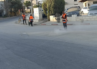 جانب من أعمال قسم النظافة وعمال الوطن