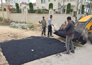 صيانة وتعبيد طرق المدينة والضواحي